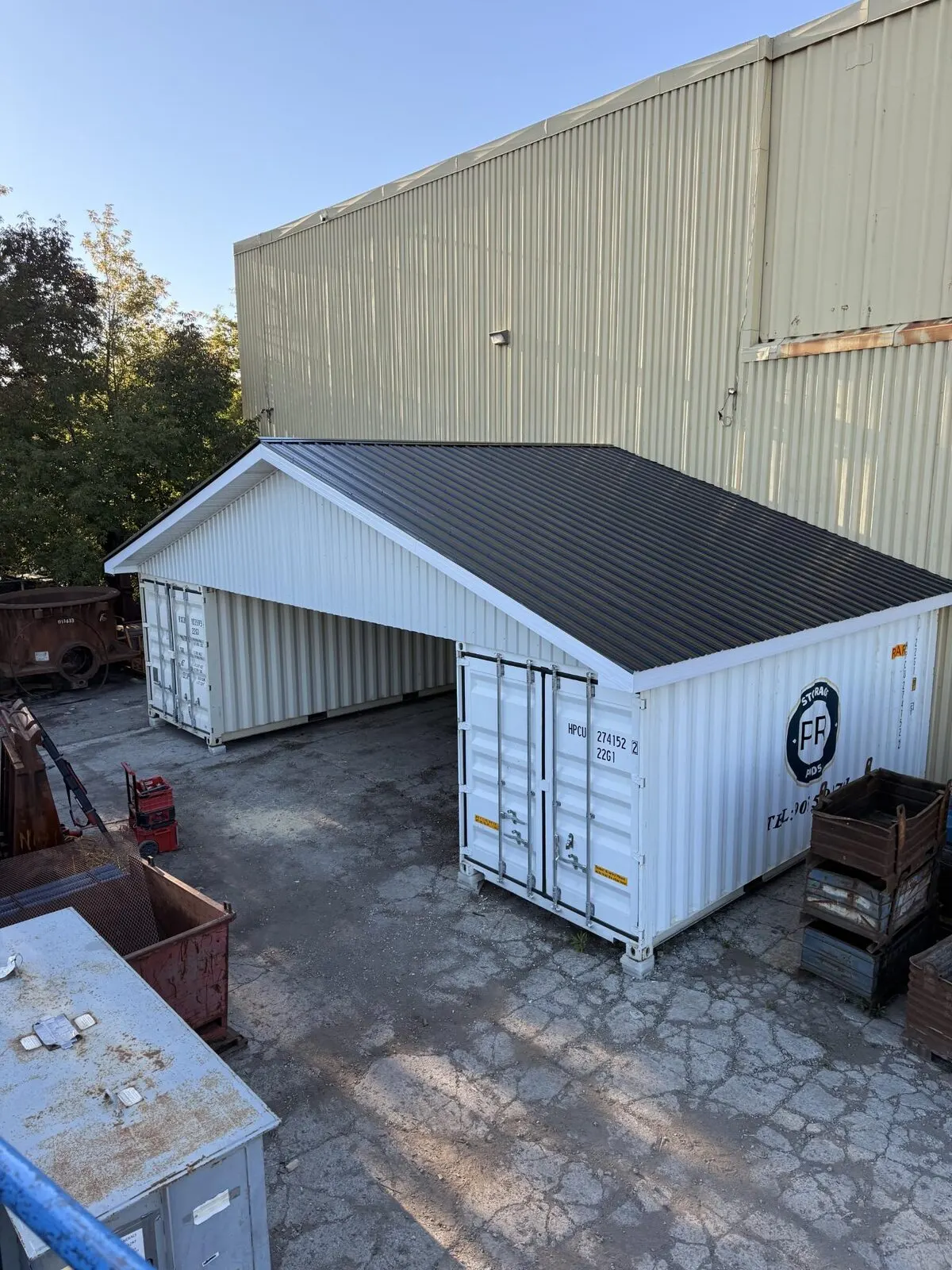 Custom-designed and built dark metal gable roof in Oshawa