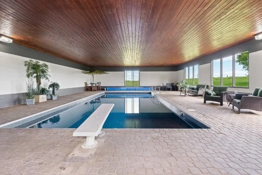 Indoor pool with wood ceiling